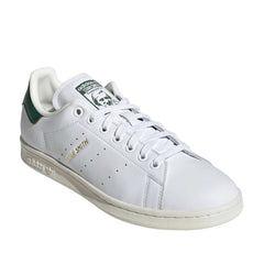Un paio di Adidas Originals Stan Smith Gold Footwear Un paio di Adidas Originals Stan Smith Gold Footwear