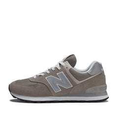 Un paio di New Balance 574 Green Leaf Footwear Un paio di New Balance 574 Green Leaf Footwear