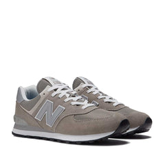 Un paio di New Balance 574 Green Leaf Footwear Un paio di New Balance 574 Green Leaf Footwear