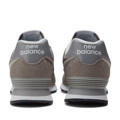 Un paio di New Balance 574 Green Leaf Footwear Un paio di New Balance 574 Green Leaf Footwear