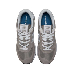 Un paio di New Balance 574 Green Leaf Footwear Un paio di New Balance 574 Green Leaf Footwear